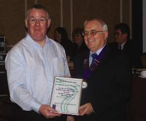 Bob collects award