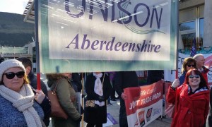 Susan Kennedy and Inez Teece with branch banner